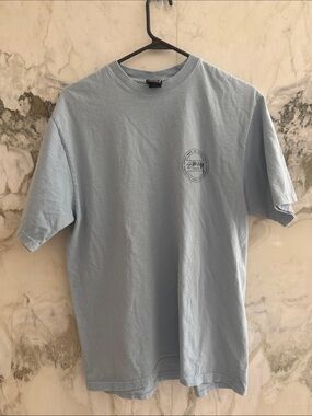 Stussy Light Blue Short Sleeve Crewneck T‑Shirt with Chest Emblem